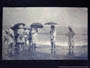 妙高林間学校写真帖（昭和二年頃） 波打ち際の傘をさす児童達